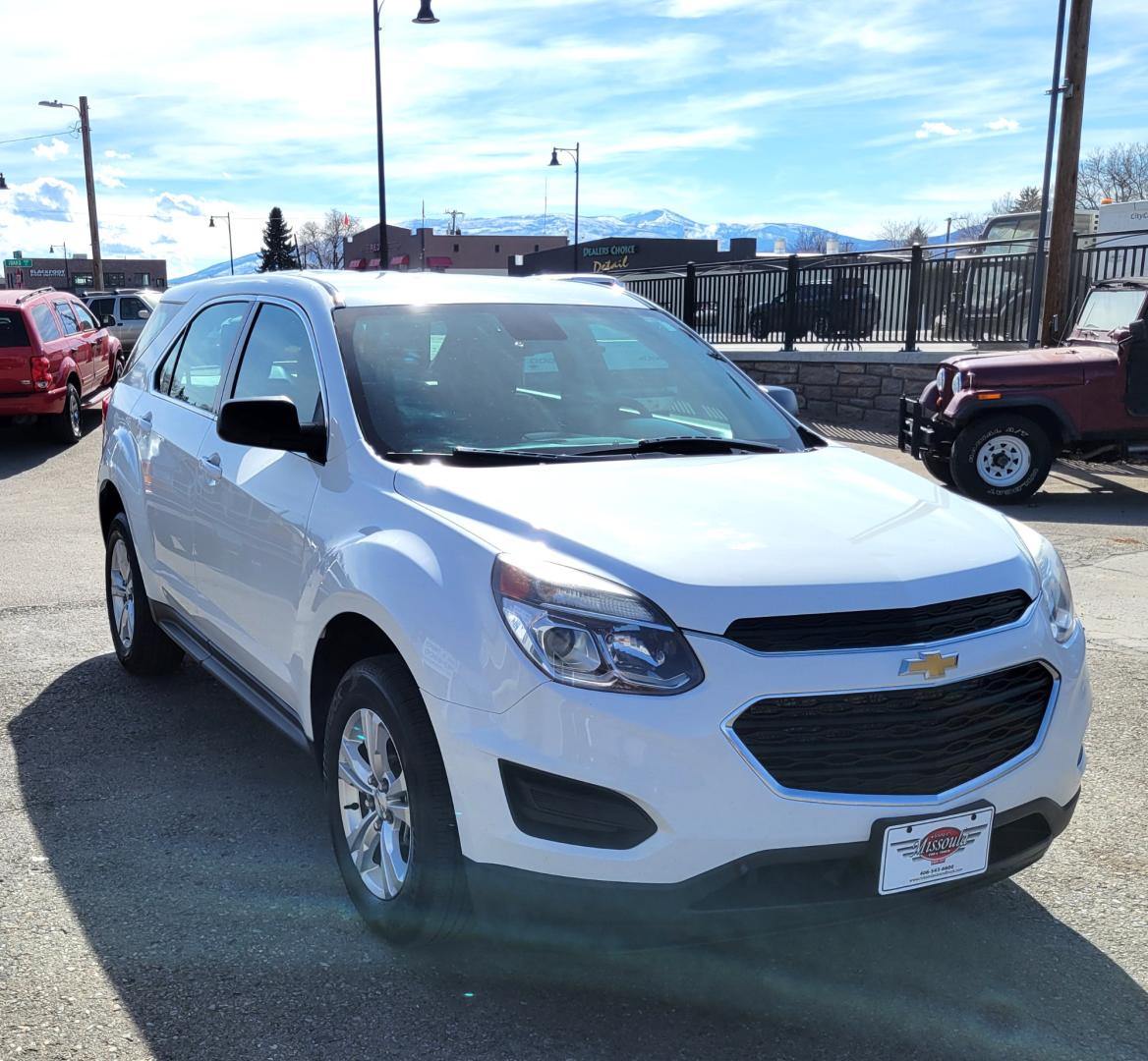 2017 White /Black Chevrolet Equinox LS 2WD (2GNALAEK3H1) with an 2.4L L4 DOHC 16V FFV engine, 6A transmission, located at 450 N Russell, Missoula, MT, 59801, (406) 543-6600, 46.874496, -114.017433 - Nice Front Wheel Drive SUV. 2.4L I4 Engine. 6 Speed Automatic Transmission. Bluetooth. Backup Camera. Air. Cruise. Tilt. Power Windows and Locks. - Photo#5